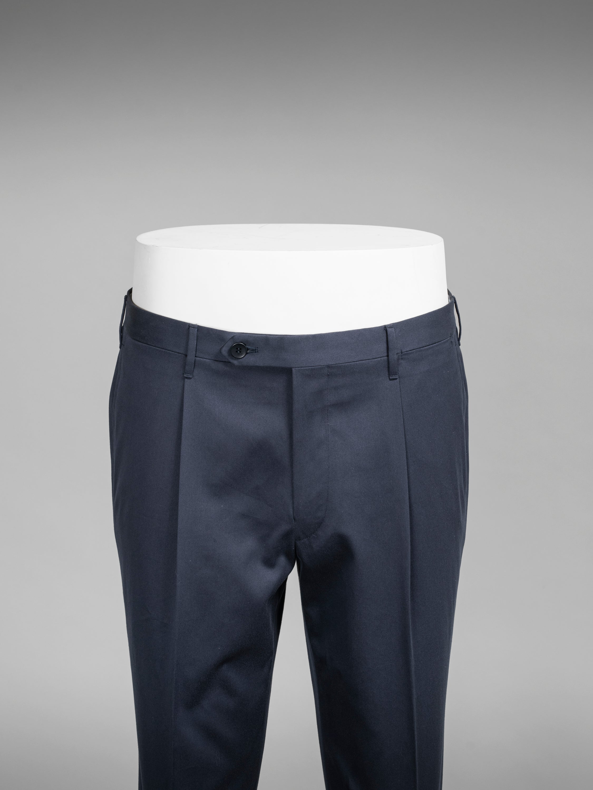 Dark blue pair of regular fit cotton trousers
